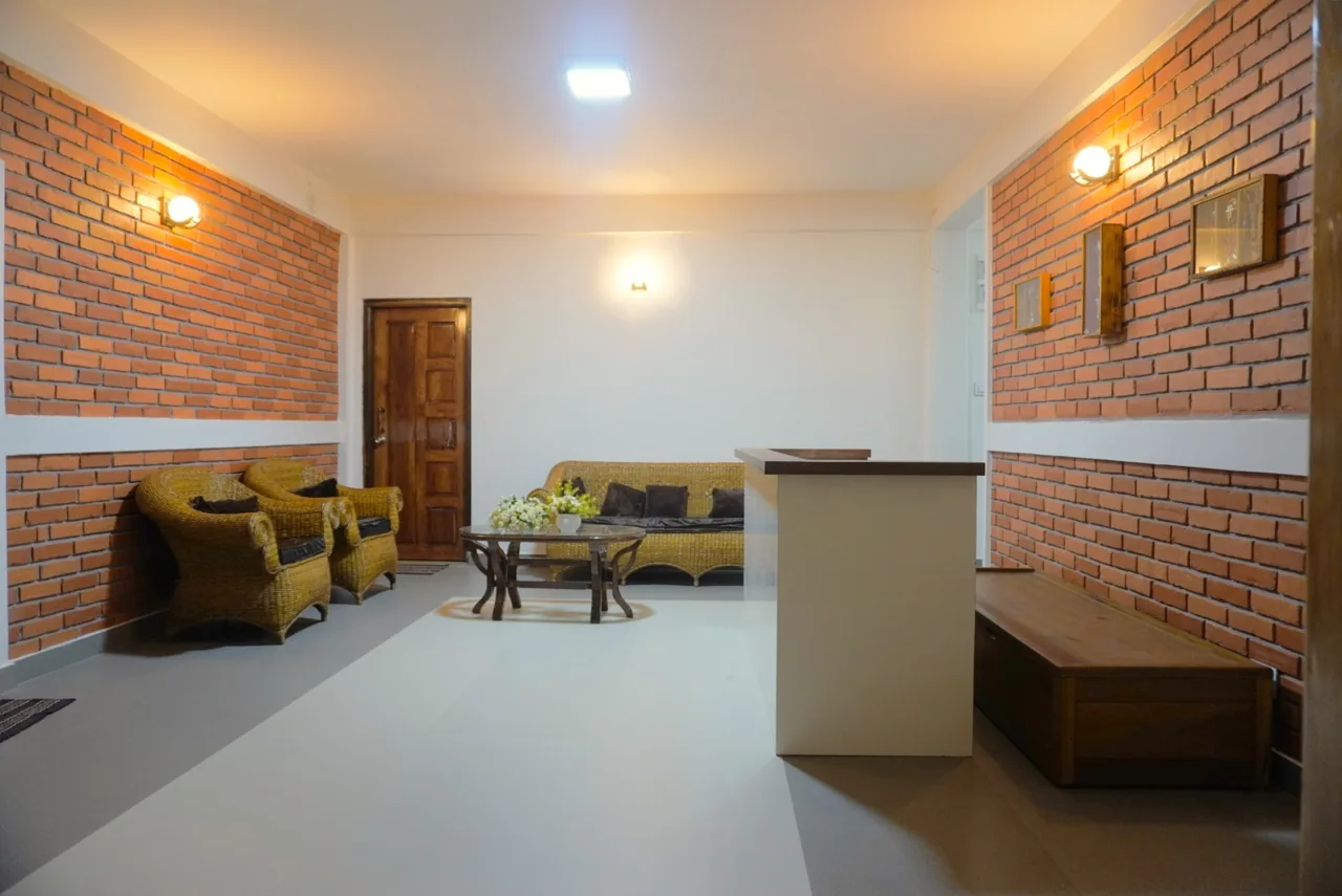 The warm brick-lined common area